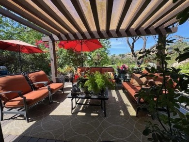 Located on a scenic cul-de-sac, this beautifully renovated home on Villages Golf and Country Club in California - for sale on GolfHomes.com, golf home, golf lot