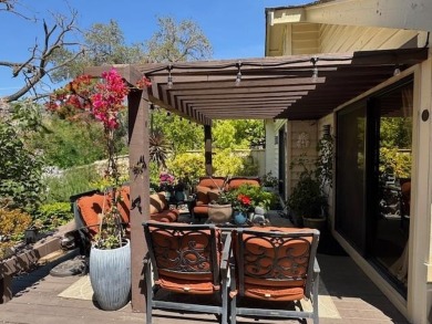 Located on a scenic cul-de-sac, this beautifully renovated home on Villages Golf and Country Club in California - for sale on GolfHomes.com, golf home, golf lot