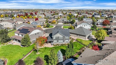 At the end of a quiet cul-de-sac in Windsor's prestigious Water on Pelican Lakes Golf and Country Club in Colorado - for sale on GolfHomes.com, golf home, golf lot
