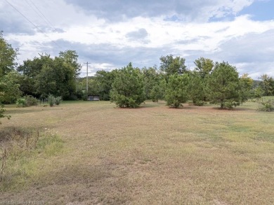 Welcome to this updated 3-bedroom, 3-bathroom home on over 3 on Eagle Crest Golf Course in Arkansas - for sale on GolfHomes.com, golf home, golf lot