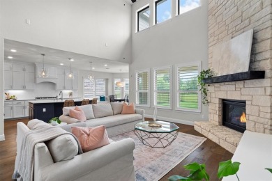Built in 2021, this stunning 5-bedroom, 4.5-bath white brick on Lantana Golf Club in Texas - for sale on GolfHomes.com, golf home, golf lot