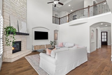 Built in 2021, this stunning 5-bedroom, 4.5-bath white brick on Lantana Golf Club in Texas - for sale on GolfHomes.com, golf home, golf lot