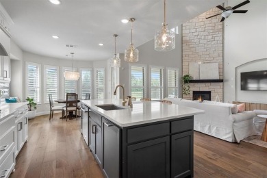 Built in 2021, this stunning 5-bedroom, 4.5-bath white brick on Lantana Golf Club in Texas - for sale on GolfHomes.com, golf home, golf lot