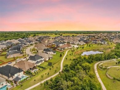 Built in 2021, this stunning 5-bedroom, 4.5-bath white brick on Lantana Golf Club in Texas - for sale on GolfHomes.com, golf home, golf lot