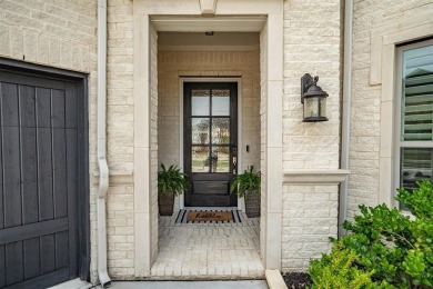 Built in 2021, this stunning 5-bedroom, 4.5-bath white brick on Lantana Golf Club in Texas - for sale on GolfHomes.com, golf home, golf lot