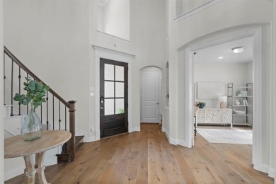 Built in 2021, this stunning 5-bedroom, 4.5-bath white brick on Lantana Golf Club in Texas - for sale on GolfHomes.com, golf home, golf lot