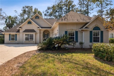 This property offers a spacious 3-bedroom, 2-bath layout with a on Laurel Island Links in Georgia - for sale on GolfHomes.com, golf home, golf lot