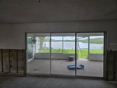 Welcome to a MAINLAND WATERFRONT OPPORTUNITY in the highly on The Tides Golf Club in Florida - for sale on GolfHomes.com, golf home, golf lot