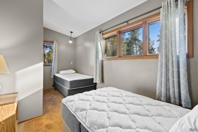 TURNKEY CABIN RETREAT. This three-level cabin sits in the pines on  in South Dakota - for sale on GolfHomes.com, golf home, golf lot