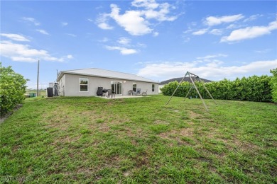 This move-in ready 3-bedroom, 2-bath home is designed with a on Burnt Store Golf Club in Florida - for sale on GolfHomes.com, golf home, golf lot