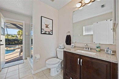 Welcome to this move-in ready saltwater pool home in Rotonda on Pinemoor West Golf Club in Florida - for sale on GolfHomes.com, golf home, golf lot