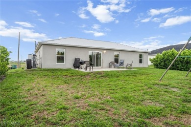This move-in ready 3-bedroom, 2-bath home is designed with a on Burnt Store Golf Club in Florida - for sale on GolfHomes.com, golf home, golf lot