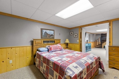 TURNKEY CABIN RETREAT. This three-level cabin sits in the pines on  in South Dakota - for sale on GolfHomes.com, golf home, golf lot