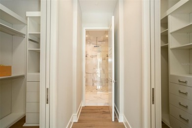 Scheduled for completion early August - Unicorp National on Ritz-Carlton Golf Club, Grande Lakes Orlando in Florida - for sale on GolfHomes.com, golf home, golf lot