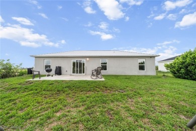 This move-in ready 3-bedroom, 2-bath home is designed with a on Burnt Store Golf Club in Florida - for sale on GolfHomes.com, golf home, golf lot