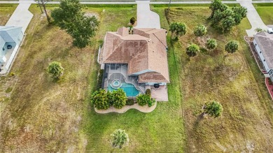 Welcome to this move-in ready saltwater pool home in Rotonda on Pinemoor West Golf Club in Florida - for sale on GolfHomes.com, golf home, golf lot