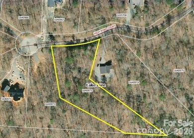 Build your dream mountain retreat or full-time residence on one on Rumbling Bald Resort on Lake Lure in North Carolina - for sale on GolfHomes.com, golf home, golf lot