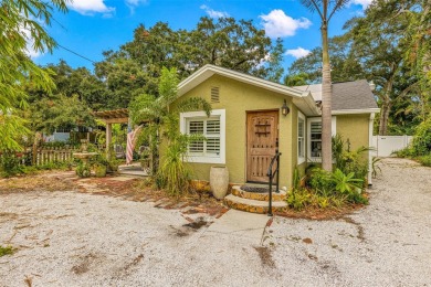 Nestled just a block away from the serene Whitcomb Bayou, this on Tarpon Springs Golf Course in Florida - for sale on GolfHomes.com, golf home, golf lot