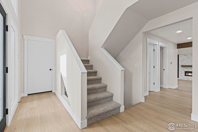 Architectural elegance meets modern luxury in this exceptional on Cattail Creek Golf Course in Colorado - for sale on GolfHomes.com, golf home, golf lot