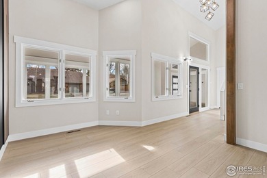 Architectural elegance meets modern luxury in this exceptional on Cattail Creek Golf Course in Colorado - for sale on GolfHomes.com, golf home, golf lot