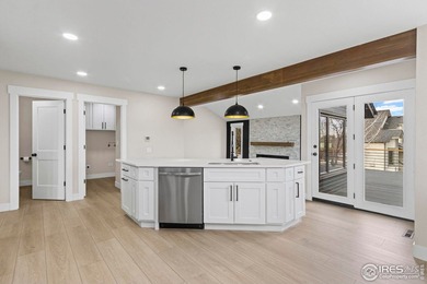 Architectural elegance meets modern luxury in this exceptional on Cattail Creek Golf Course in Colorado - for sale on GolfHomes.com, golf home, golf lot