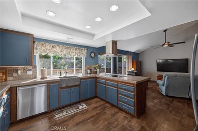 Set on 1.33 acres along a private road in a small community on Pala Mesa Resort in California - for sale on GolfHomes.com, golf home, golf lot