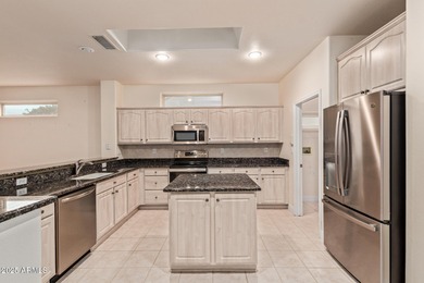 This 2-bedroom, 2-bath Cholla model features neutral tones and on Granite Falls Golf Club  in Arizona - for sale on GolfHomes.com, golf home, golf lot