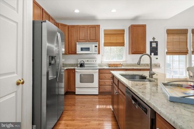 This beautiful end unit carriage house is located on a premium on Bear Trap Dunes Golf Club in Delaware - for sale on GolfHomes.com, golf home, golf lot