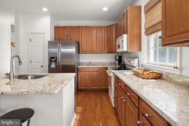 This beautiful end unit carriage house is located on a premium on Bear Trap Dunes Golf Club in Delaware - for sale on GolfHomes.com, golf home, golf lot