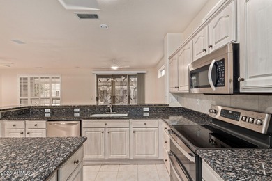 This 2-bedroom, 2-bath Cholla model features neutral tones and on Granite Falls Golf Club  in Arizona - for sale on GolfHomes.com, golf home, golf lot