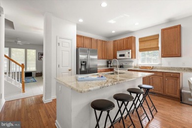 This beautiful end unit carriage house is located on a premium on Bear Trap Dunes Golf Club in Delaware - for sale on GolfHomes.com, golf home, golf lot