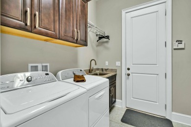 Welcome to your dream home in the exclusive Neo-Traditional on Kelly Plantation Golf Club in Florida - for sale on GolfHomes.com, golf home, golf lot