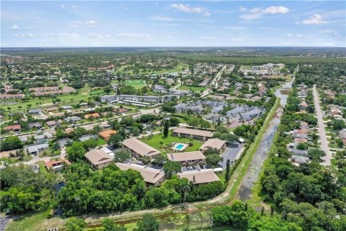 Experience the perfect Florida getaway in this beautifully on Royal Palm Golf Club in Florida - for sale on GolfHomes.com, golf home, golf lot