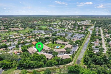 Experience the perfect Florida getaway in this beautifully on Royal Palm Golf Club in Florida - for sale on GolfHomes.com, golf home, golf lot
