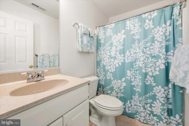 This beautiful end unit carriage house is located on a premium on Bear Trap Dunes Golf Club in Delaware - for sale on GolfHomes.com, golf home, golf lot