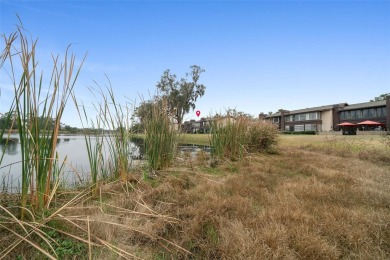 Water Front furnished 55+ Condo.  Enjoy lakefront living on Lake on Country Club At Silver Springs Shores in Florida - for sale on GolfHomes.com, golf home, golf lot