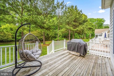 This beautiful end unit carriage house is located on a premium on Bear Trap Dunes Golf Club in Delaware - for sale on GolfHomes.com, golf home, golf lot