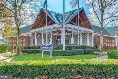 This beautiful end unit carriage house is located on a premium on Bear Trap Dunes Golf Club in Delaware - for sale on GolfHomes.com, golf home, golf lot