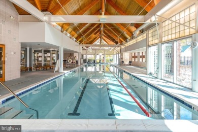 This beautiful end unit carriage house is located on a premium on Bear Trap Dunes Golf Club in Delaware - for sale on GolfHomes.com, golf home, golf lot