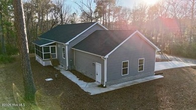 A stunning new construction ranch style home located right on on Minnesott Golf and Country Club in North Carolina - for sale on GolfHomes.com, golf home, golf lot