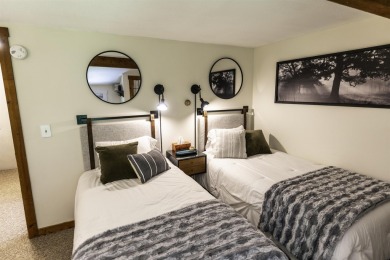 This beautifully reimagined Quechee Hollow end unit is turnkey! on Quechee Club in Vermont - for sale on GolfHomes.com, golf home, golf lot