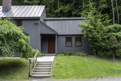 This beautifully reimagined Quechee Hollow end unit is turnkey! on Quechee Club in Vermont - for sale on GolfHomes.com, golf home, golf lot