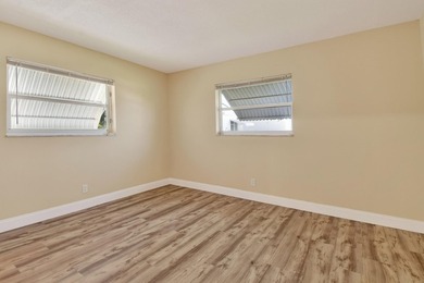 Beautifully maintained single family 2BR/1BA home with flexible on Leisureville Community Golf Course in Florida - for sale on GolfHomes.com, golf home, golf lot