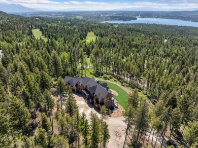 Escape to 12.5 acres of ski mountain privacy and Whitefish Lake on Iron Horse Golf Club in Montana - for sale on GolfHomes.com, golf home, golf lot
