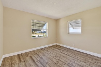 Beautifully maintained single family 2BR/1BA home with flexible on Leisureville Community Golf Course in Florida - for sale on GolfHomes.com, golf home, golf lot