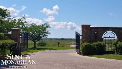 Are you looking to build your dream home with views of Grand on Lochen Heath Golf Course in Michigan - for sale on GolfHomes.com, golf home, golf lot