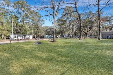 Welcome to your coastal oasis at Shellman Bluff! This unique and on Sapelo Hammock Golf Club in Georgia - for sale on GolfHomes.com, golf home, golf lot