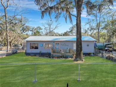 Welcome to your coastal oasis at Shellman Bluff! This unique and on Sapelo Hammock Golf Club in Georgia - for sale on GolfHomes.com, golf home, golf lot