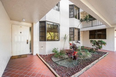 Welcome to this beautifully maintained first-floor corner condo on The Country Club At Boca Raton in Florida - for sale on GolfHomes.com, golf home, golf lot