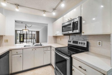 Welcome to this beautifully maintained first-floor corner condo on The Country Club At Boca Raton in Florida - for sale on GolfHomes.com, golf home, golf lot